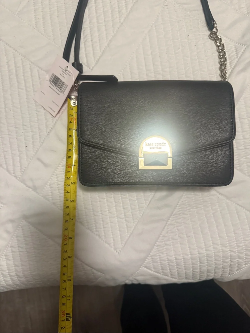 kate spade black crossbody with gold-tone clasp